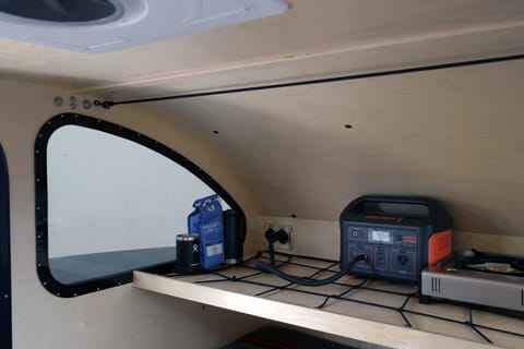 Our custom Wintable window is a wonderful option for the DDA. It provides a useful surface outside of the trailer, and floods in light to the cabin when you need it. 