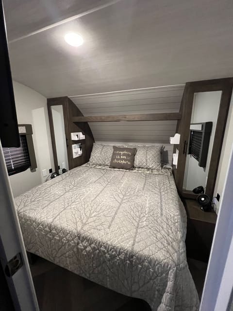 Main bedroom- RV Queen bed with Tempur-pedic mattress pad. 4 pillows. All bedding provided. 