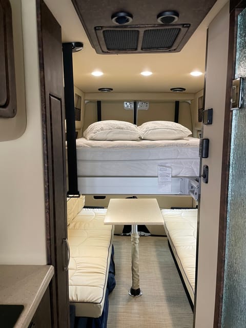Automatic loft bed. Keep raised for the day and use the plush lounge seating during the day. Down at night for full comfort. Full size bed. 