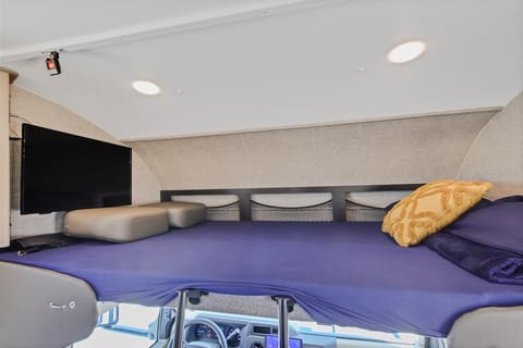Over head bunk bed. Make the most of your RV's space by accommodating extra guests or creating a sleepover haven for the kids.