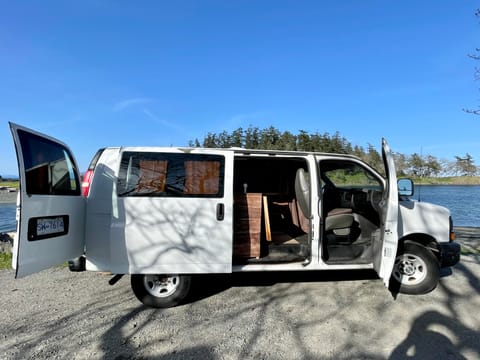 Van from the outside with all doors open