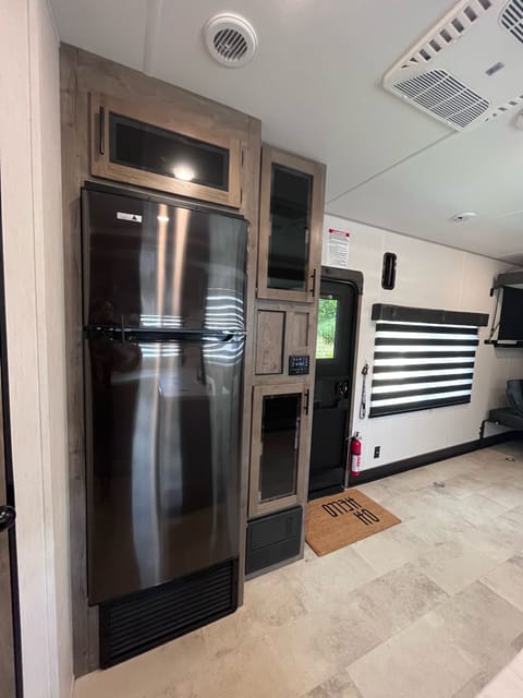 Full size fridge with freezer
plenty of room for your food 