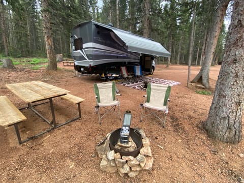 Fire can include. Meets fire ban restrictions so you can always have a fire. Quick connection to RV propane for easy setup. 