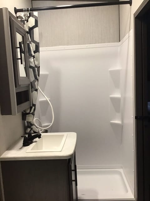 This was one of the many reasons I bought the RV. This shower provides max headspace. If you're tall you understand!