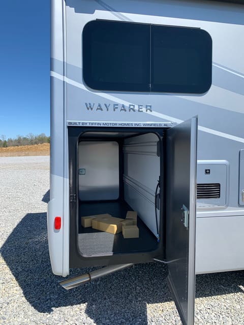 huge exterior storage space which can hold two foldable bikes, kayaks, or other personal belongings