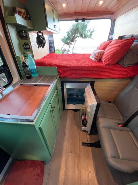 Kitchen including a solar powered fridge/freezer.