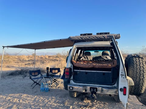 The awnings make all the difference, giving you shade off of the side and the back of the rig. They also pop up in less than 5 minutes!