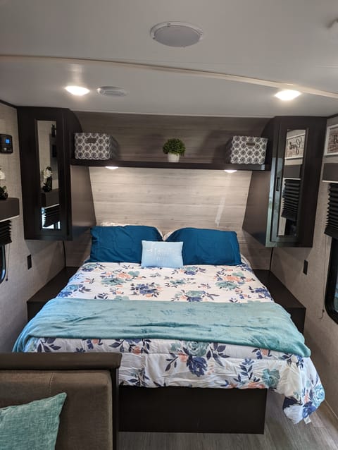Queen bed at front of trailer