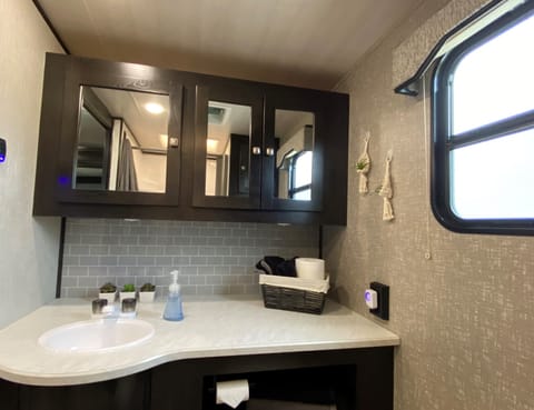 Enjoy the large private bathroom that has almost every amenity you need for a comfortable stay.