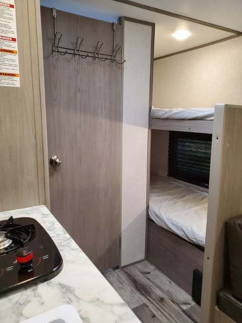 2 bunk beds with added storage under bottom bunk. 






