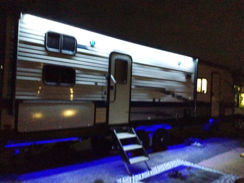 There is blue LED lighting on the underside of the RV and white LED lighting under the awning