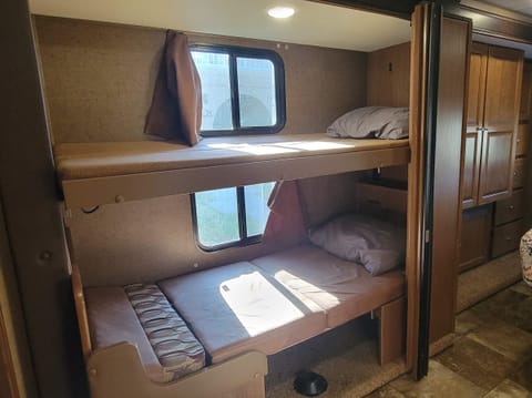 Twin bunk beds converted from a 2-person dinette table