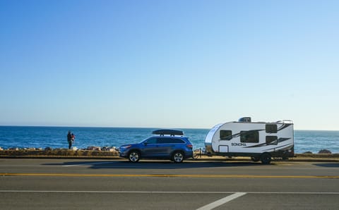Our Toyota Highlander pulling Sami on Highway 101 with ease. We pulled over for with our very own restrooms, snacks and nap area in the RV.