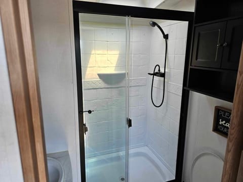 stand up shower inside of bathroom