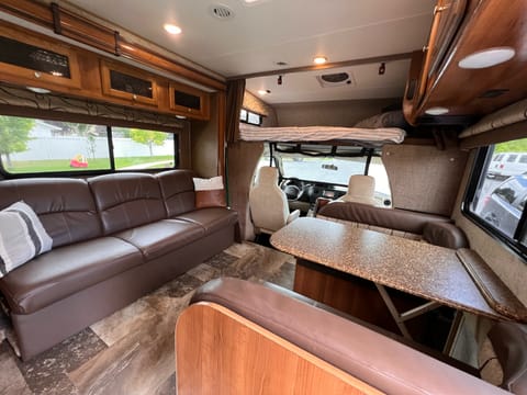 couch that converts to bed, dinette that converts to a bed-  over the cab queen bed