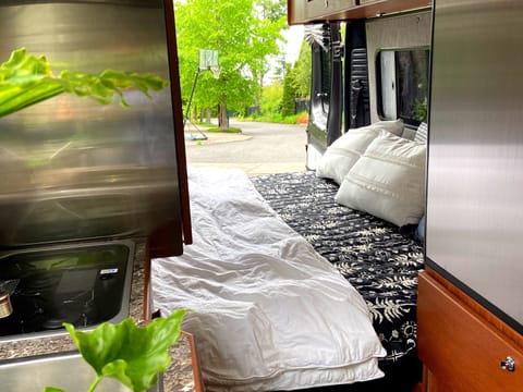 King bed with soft, comfy linens.  Windows all have screen so open them up for a perfect cross breeze.