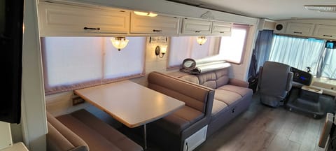 Dinette folds out into a sleeper. Couch folds out XL Full. Captain chairs rotate 180 for two extra recliner chairs. seats 9.