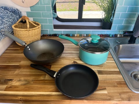 These are the pots and pans that will be included with your rental.