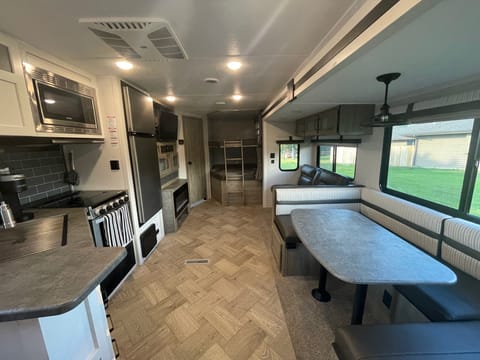 Spacious, modern, light and bright! This brand new camper is ready for you to make yourself at home and relax. Large windows with privacy blinds.