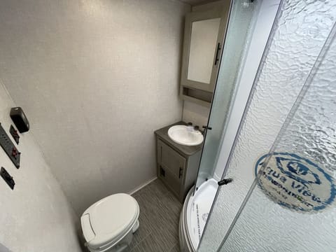 Full size bathroom with luxury amenities included. 