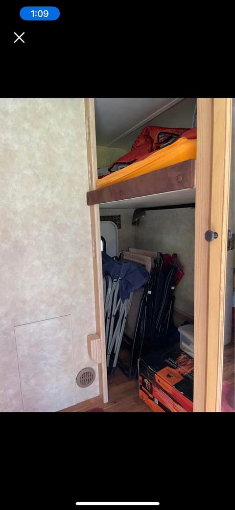 Bottom bunk flips up, for extra storage 