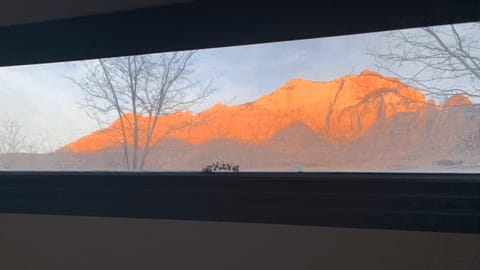 Sunrise through the stargazer window - Zion National Park