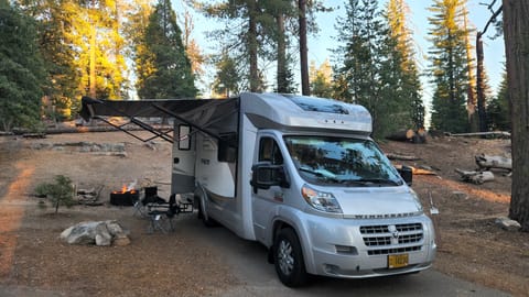 Large Awning Lawn chairs, outdoor table and outdoor rug included.