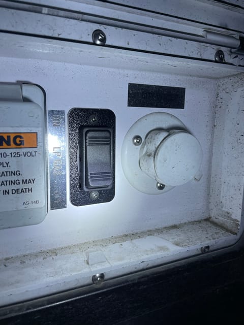 Heater on/off switch, plug in for hook ups on exterior driver side