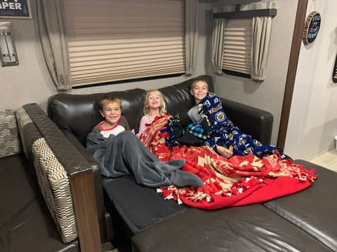 Pull out couch in use for movie night.