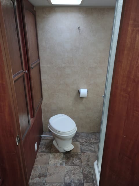 Full rear bathroom with shower and more storage space.