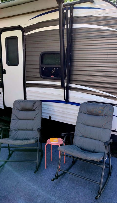 Rocking chairs, side table and exterior rug included with rental