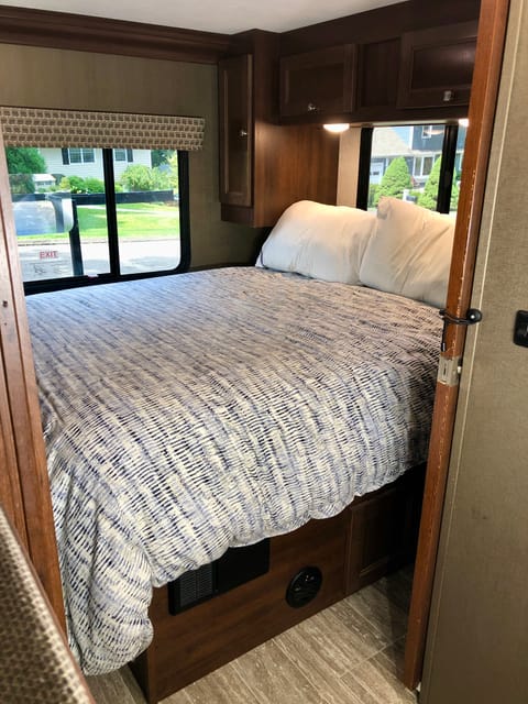 Master bed - Camper Queen - 110v outlets on either side of bed