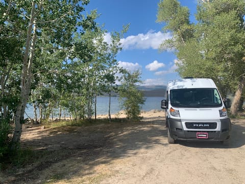 At a free dispersed camping spot in Wyoming by a beautiful and secluded lake!