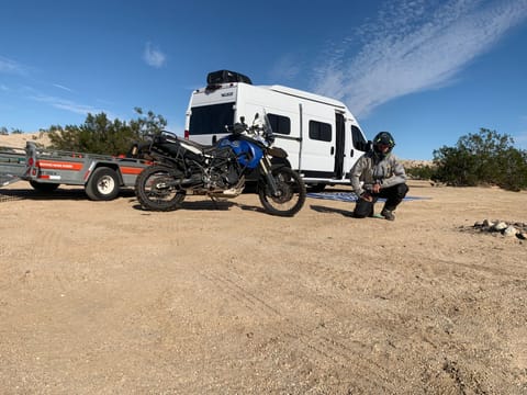 Dirt biking in the desert . Fully off grid , using solar and battery to work fridge lights music and charge devices