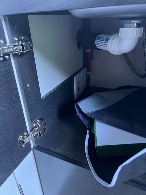 110 and 12v outlets under sink.