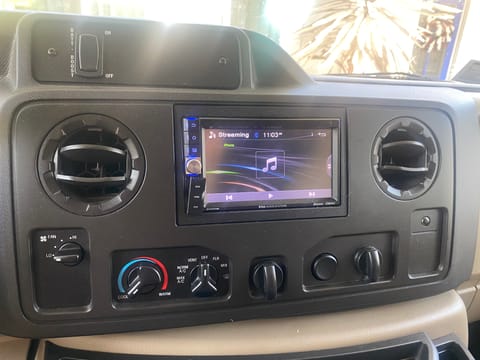 Dash with back up camera and blue tooth connect for hands free use of navigation and music.