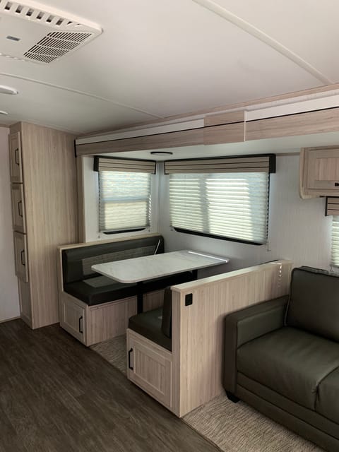 Eat, sleep, or both. The choice is your's. Dinette turns in to a bed and has additional storage underneath.
