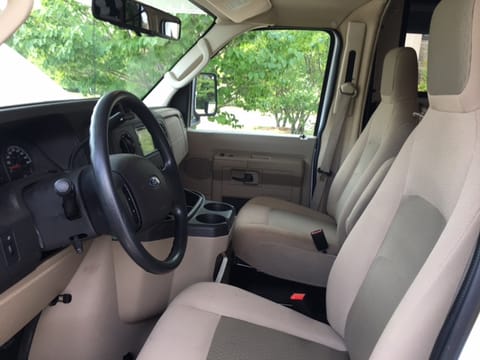 Drivers cab area with walk through access to coach