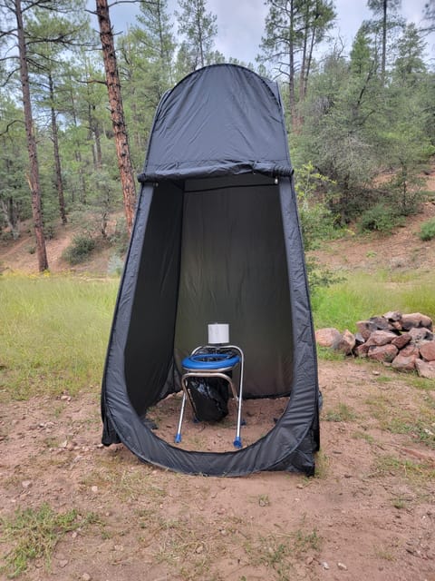 Privacy tent with commode