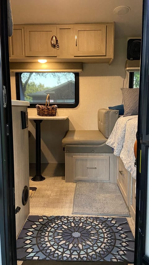 Bench seating that also converts into a sofa or a sleeper. Table top is removable. Can sit 2-4.