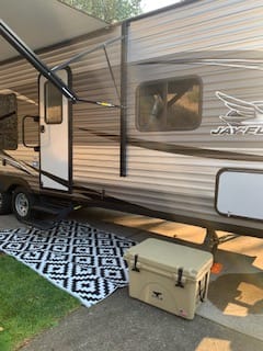 Photo of outdoor rug and optional Orca Cooler