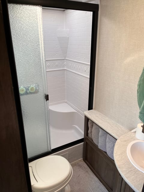 Large shower, and comfortable bathroom space. 