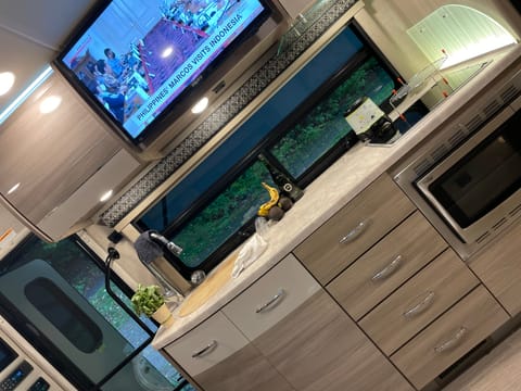 The kitchen is fully stocked with utensils and cookware along with basics like salt, pepper, tin foil, paper towels, etc 