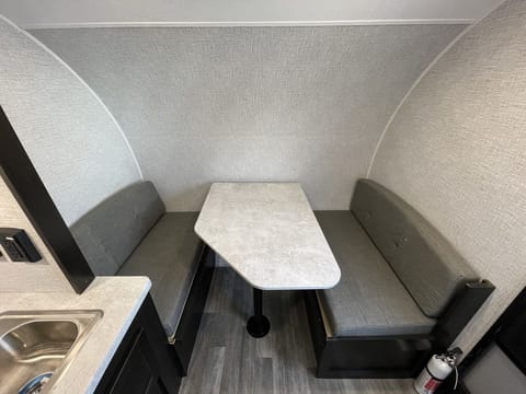 Spacious Dinette that turns into sleeper.