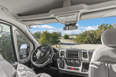 Comfortable captain's chairs that rotate to face cabin.