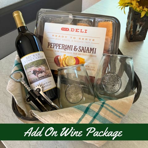 Let’s Celebrate! Wine, charcuterie, and glasses for two. Add this package onto your stay at check out and let us know if you’d like red or white. 