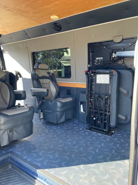 Retractable TV on a swivel so you can also watch from outside the van!