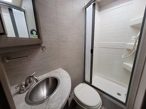 Perfect size bathroom with tall shower 