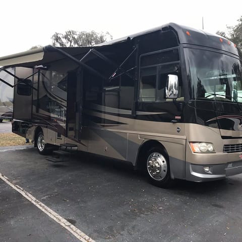 Side View of Coach with outdoor awning extended