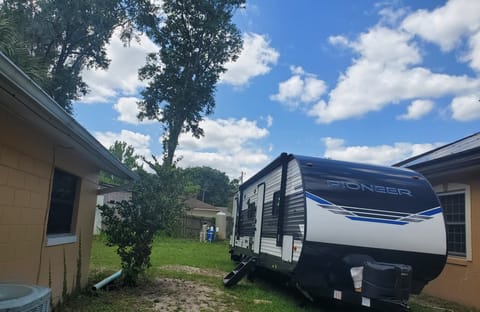 Trailer has one slide out. And storage place. Rack in the back.